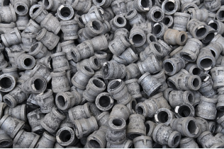 Freshly annealed malleable pipe fittings blanks.png